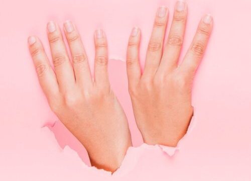 hands-through-paper-hole_23-2148136072