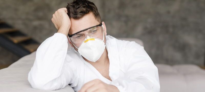 medium-shot-tired-man-with-medical-mask
