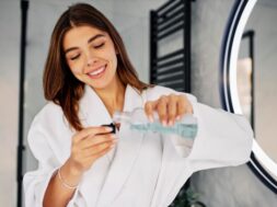 young-woman-pouring-mouth-wash_23-2148837531