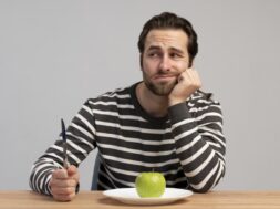 person-with-eating-disorder-trying-eat-healthy (1)