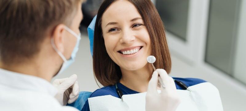 Dentist discussing with patient treatment plan