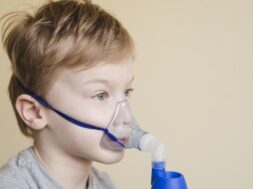 side-view-boy-with-oxygen-mask