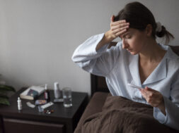 medium-shot-sick-woman-with-fever