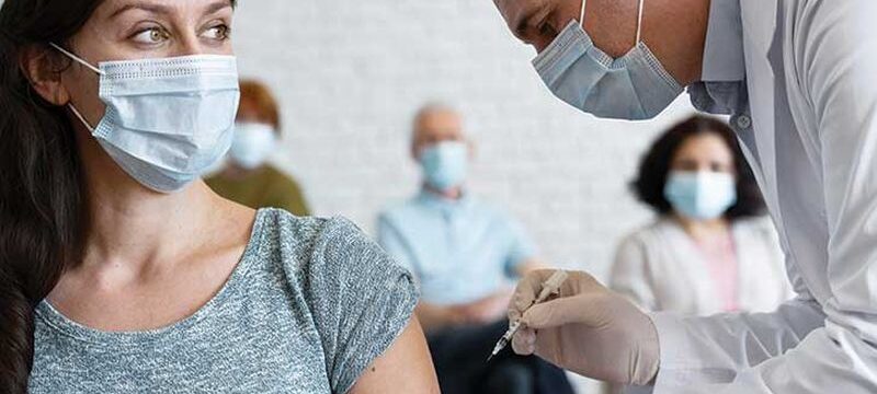 woman-getting-vaccine 1