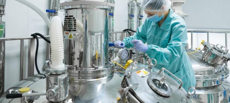Screenshot 2024-11-19 at 10-38-06 Free Photo Pharmaceutical factory woman worker in protective clothing operating production line in sterile environment