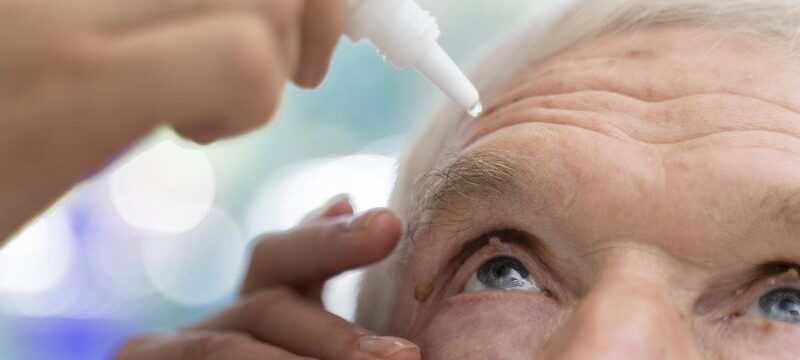 doctor-pouring-some-eye-drops-patient