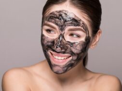young-beautiful-woman-mask-face-therapeutic-black-mud-spa-treatment_231208-1553