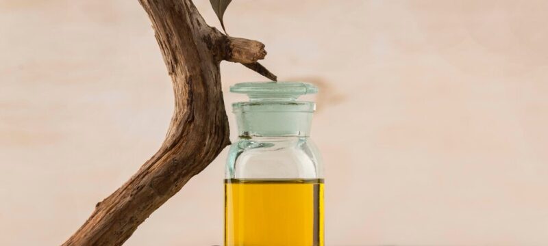 arrangement-jojoba-oil-bottle_23-2149022424