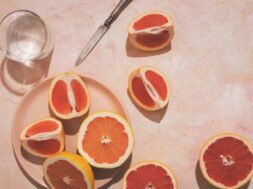 top-view-grapefruit-plate-arrangement_23-2148934783
