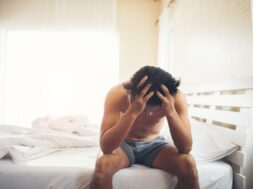 worried-man-sitting-bed-morning-serious-thinking-something_1150-5053