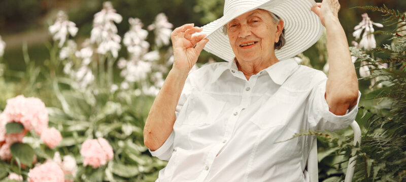 Woman 60 years relax in summer park