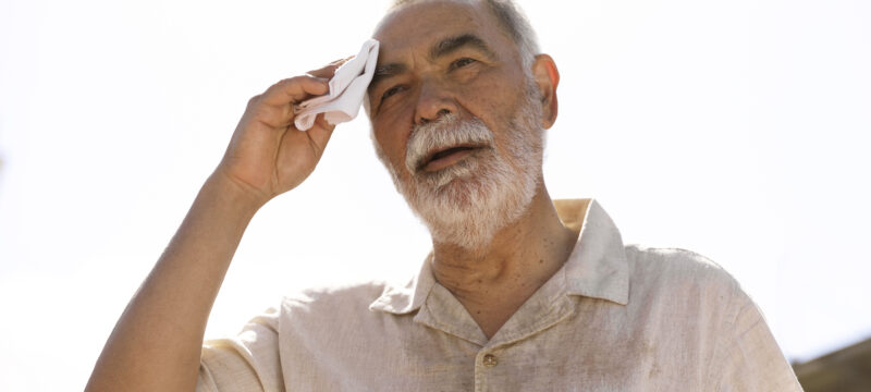 old-man-struggling-with-high-temperature (1)