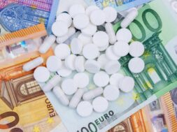 pile-medical-pills-lies-euro-banknotes-concept-rise-price-medicines-top-view_535844-1352