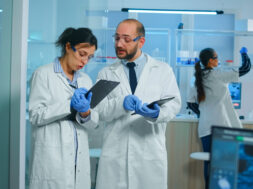 Group of medical researchers discussing about vaccine development