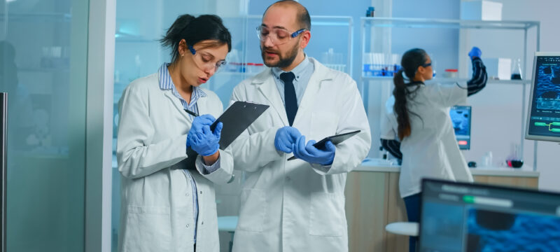 Group of medical researchers discussing about vaccine development