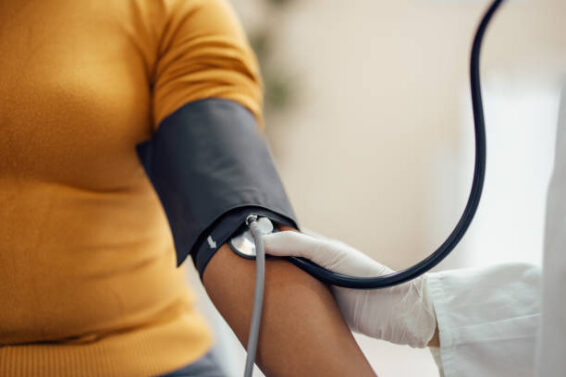 Measuring blood pressure with blood pressure manometer, sphygmomanometer.