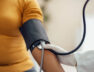 Measuring blood pressure with blood pressure manometer, sphygmomanometer.