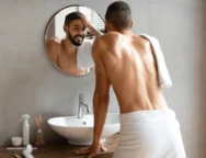 male-beauty-haircare-routine-shirtless-600nw-2080327156