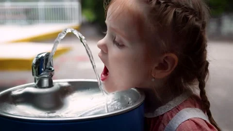 toddler-baby-girl-quenches-thirst-footage-220344665_iconl