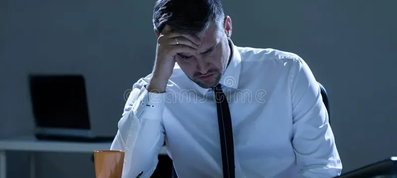 sad-man-office-view-43431767