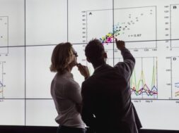 researchers-looking-at-stats
