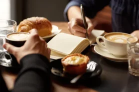 depositphotos_98980910-stock-photo-interview-in-cafe-with-coffee