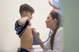 doctor-examining-child-using-stethoscope-footage-084271092_iconl