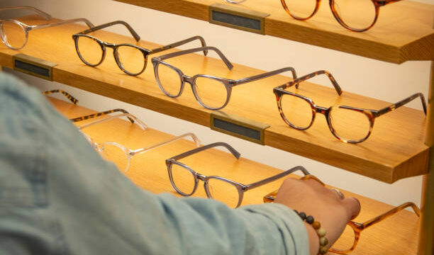 Woman selecting a pair of eyeglasses
