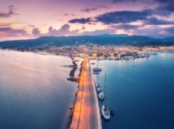 Aerial,View,Of,Road,Near,Sea,Canal,At,Night,In