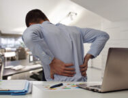 Business,Man,With,Back,Pain,An,Office,.,Pain,Relief