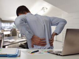 Business,Man,With,Back,Pain,An,Office,.,Pain,Relief