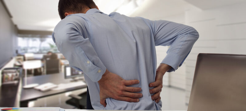 Business,Man,With,Back,Pain,An,Office,.,Pain,Relief
