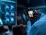 A group of medical professionals reviewing and analyzing detailed brain scans displayed on digital screens and tablets, highlighting advanced AI medical imaging technology.