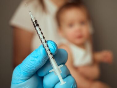 Child vaccination blurry background
